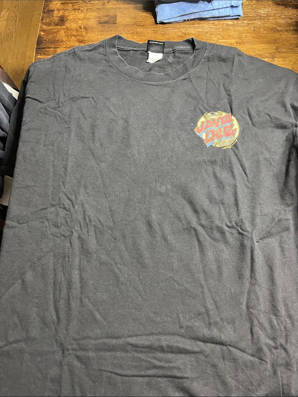 Santa Cruz Skateboards Black Tee with Small Multi-Color Chest Logo